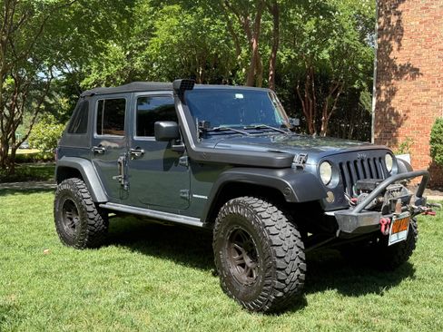 Used 2008 Jeep Wrangler Unlimited Rubicon w/ Dual Top Group AWD/4WD image 1