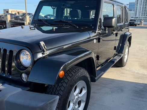 Used 2015 Jeep Wrangler Unlimited Sahara w/ Dual Top Group image 1