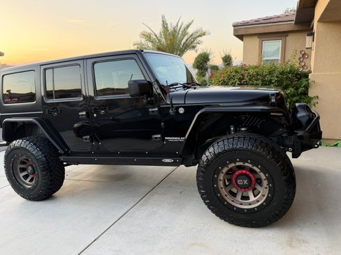 Used 2012 Jeep Wrangler Unlimited Sport AWD/4WD image 29