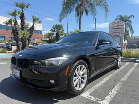 Used 2016 BMW 320i Sedan RWD image 1
