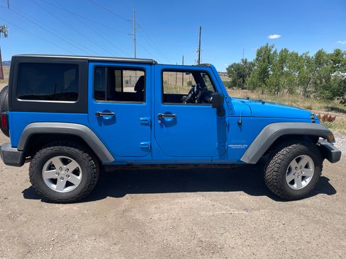 Used 2011 Jeep Wrangler Unlimited Sport AWD/4WD image 8