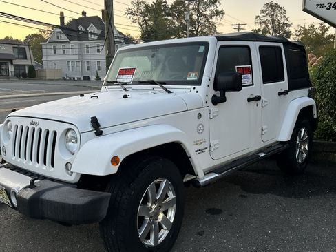 Used 2015 Jeep Wrangler Unlimited Sahara w/ Mopar Chrome Edition Group image 1