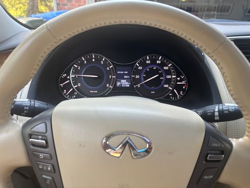 Used 2014 INFINITI QX80 4WD w/ Theater Package image 2
