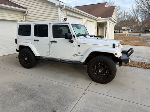 Used 2016 Jeep Wrangler Unlimited Sahara w/ Dual Top Group image 1