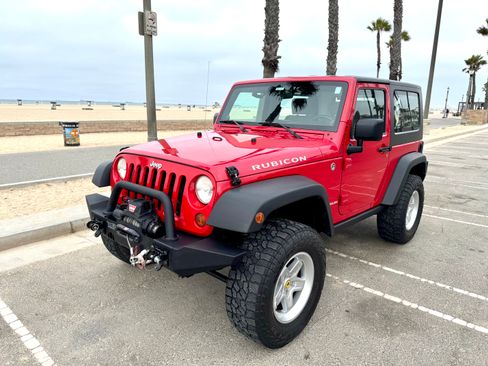 Used 2009 Jeep Wrangler Rubicon w/ Dual Top Group AWD/4WD image 1
