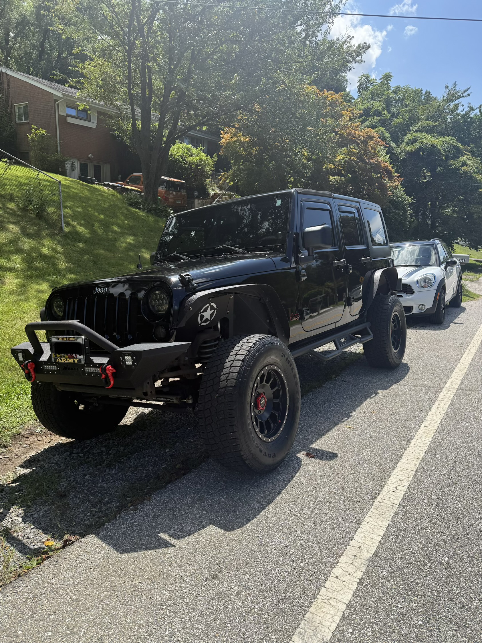Used 2011 Jeep Wrangler Unlimited Sport AWD/4WD image 1