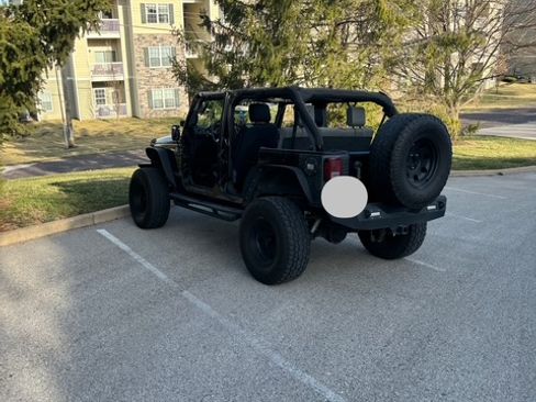 Used 2008 Jeep Wrangler Unlimited Sahara w/ Dual Top Group image 1