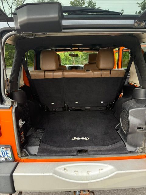 Used 2012 Jeep Wrangler Unlimited Sahara w/ Dual Top Group AWD/4WD image 11
