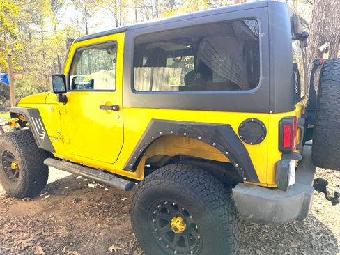 Used 2009 Jeep Wrangler X w/ Black Appearance Group AWD/4WD image 1