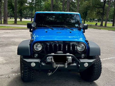 Used 2015 Jeep Wrangler Sport AWD/4WD image 1