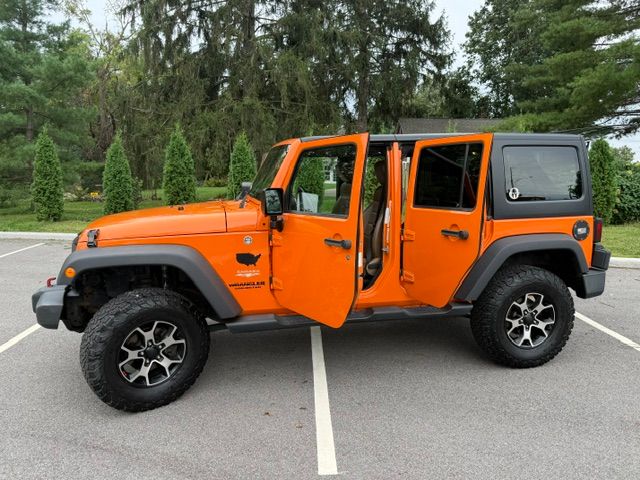 Used 2012 Jeep Wrangler Unlimited Sahara w/ Dual Top Group AWD/4WD image 2