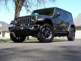 Used 2024 Jeep Wrangler Unlimited Rubicon 4xe w/ Capability Package AWD/4WD image 1