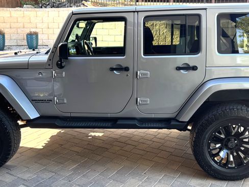 Used 2015 Jeep Wrangler Unlimited Sahara w/ Max Tow Package AWD/4WD image 1