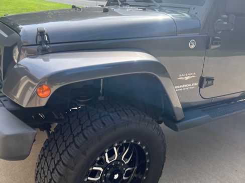 Used 2014 Jeep Wrangler Unlimited Sahara w/ Dual Top Group image 2