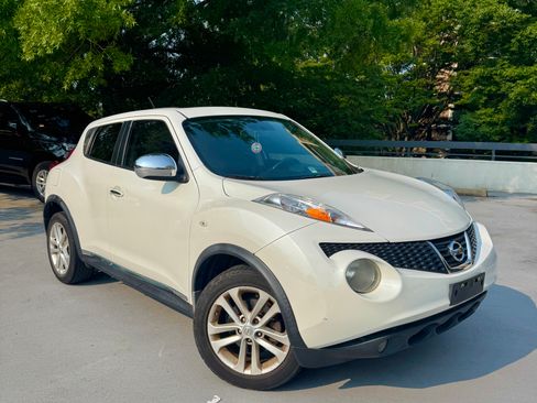 Used 2013 Nissan Juke SL w/ Chrome Pkg FWD image 1