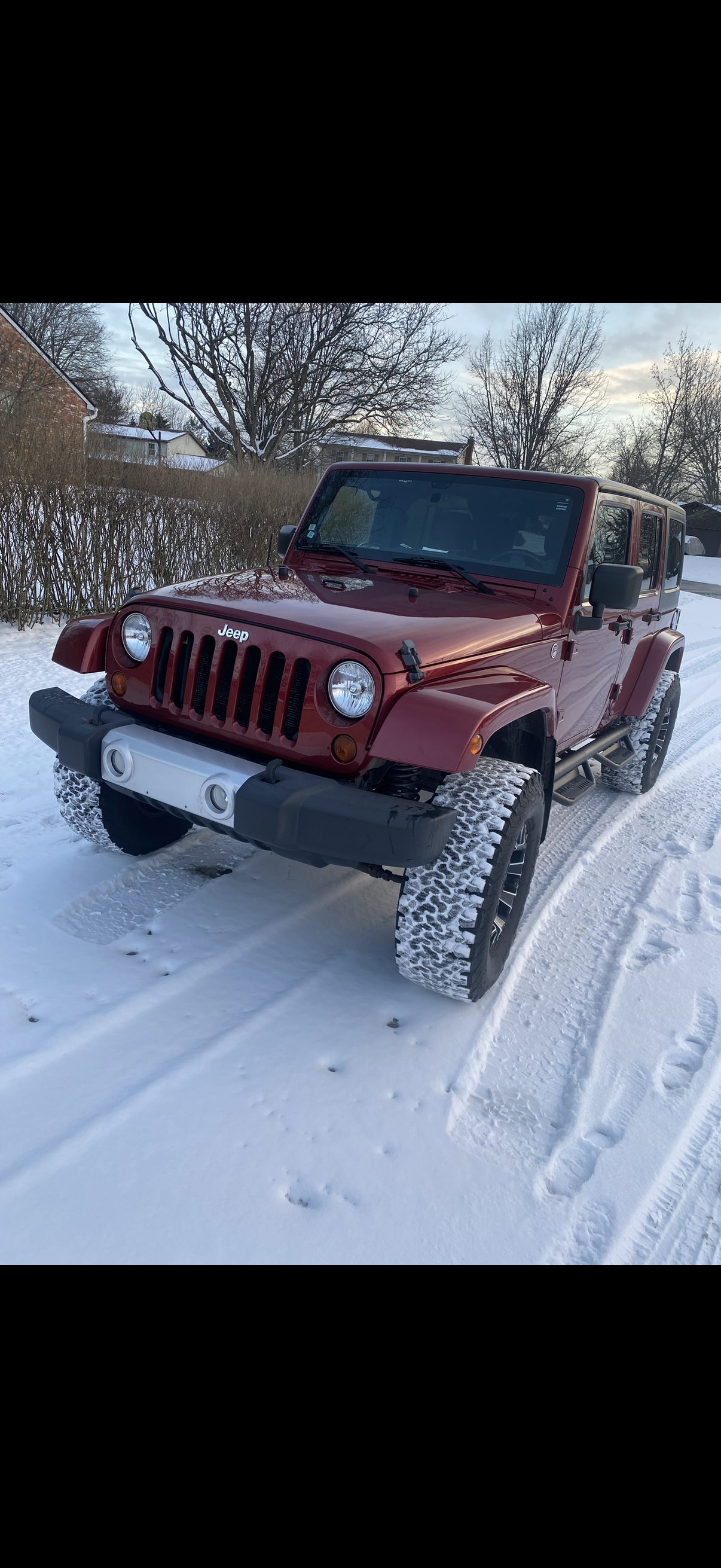 Used 2011 Jeep Wrangler Unlimited Sahara AWD/4WD image 1