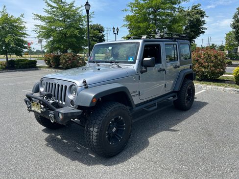 Used 2014 Jeep Wrangler Unlimited Sport w/ Connectivity Group AWD/4WD image 17