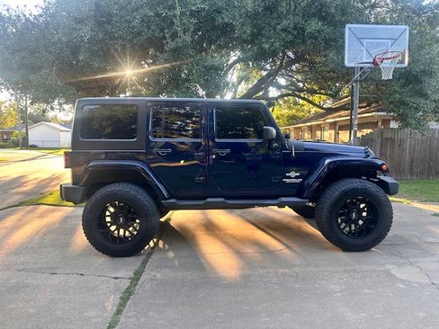 Used 2012 Jeep Wrangler Unlimited Sport AWD/4WD image 2