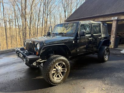 Used 2011 Jeep Wrangler Unlimited Sport