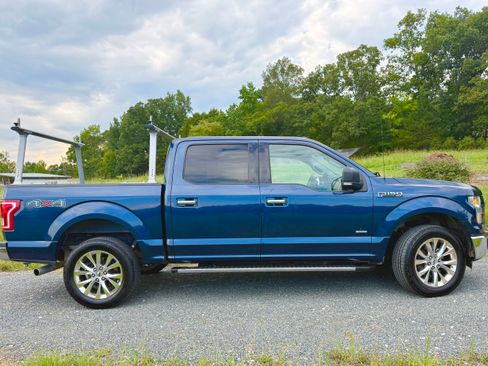 Used 2015 Ford F150 XLT w/ Equipment Group 302A Luxury AWD/4WD image 1