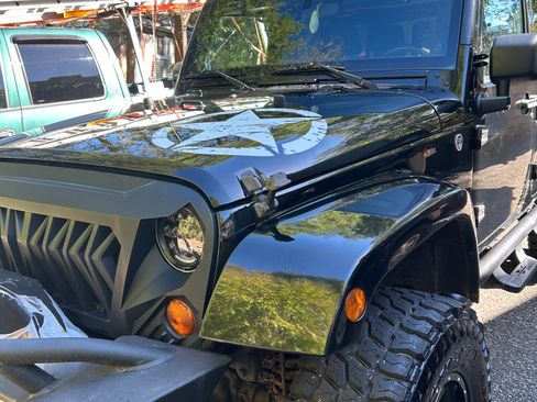 Used 2012 Jeep Wrangler Unlimited Sahara w/ Connectivity Group image 1