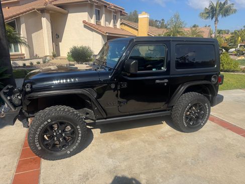 Used 2021 Jeep Wrangler Sport image 1