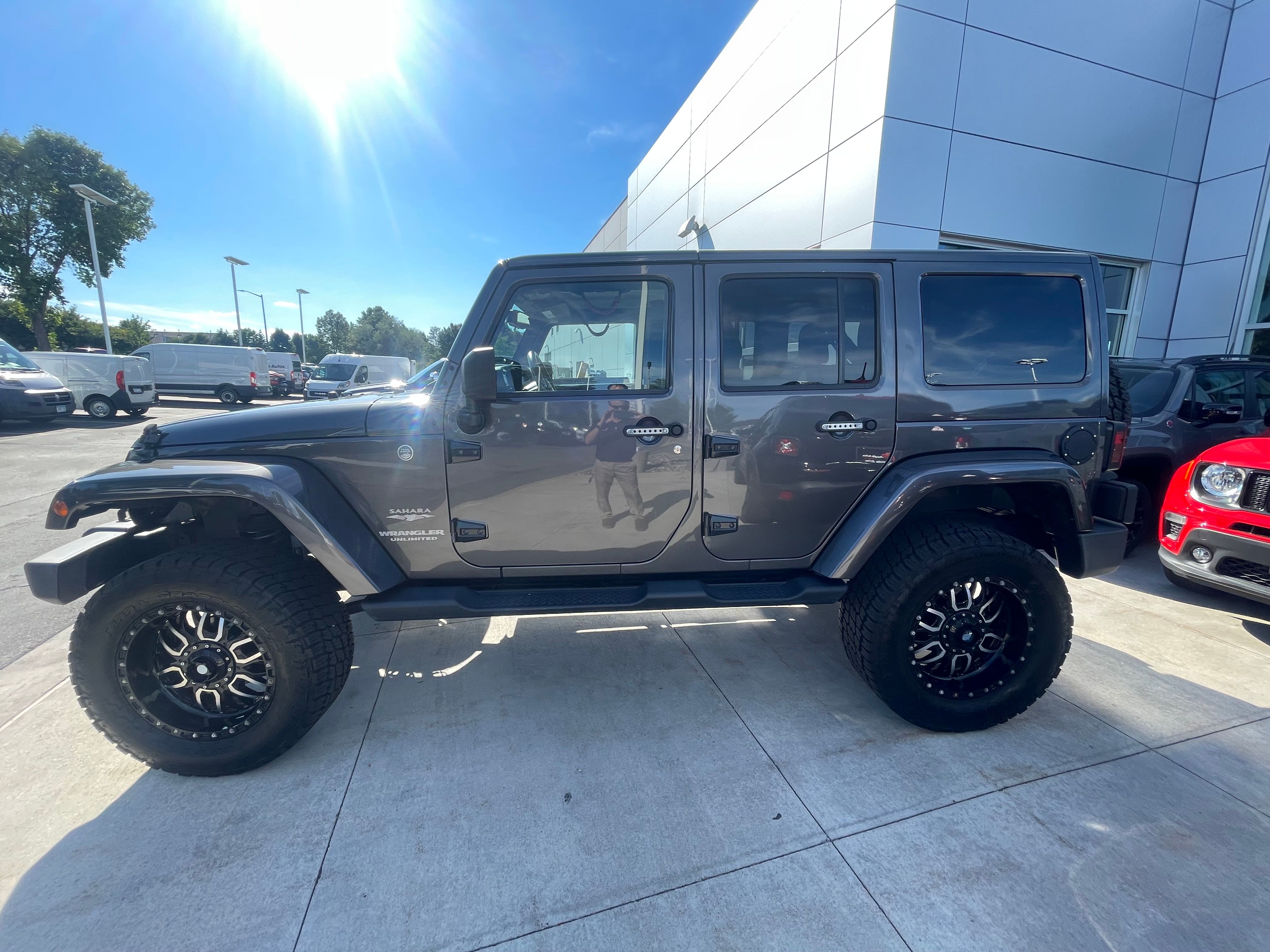 Used 2014 Jeep Wrangler Unlimited Sahara w/ Dual Top Group AWD/4WD image 1