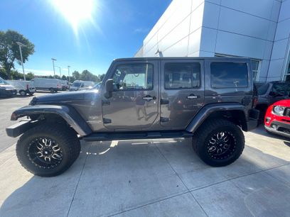 Used 2014 Jeep Wrangler Unlimited Sahara w/ Dual Top Group