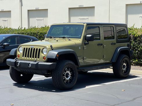 Used 2013 Jeep Wrangler Unlimited Sport AWD/4WD image 2