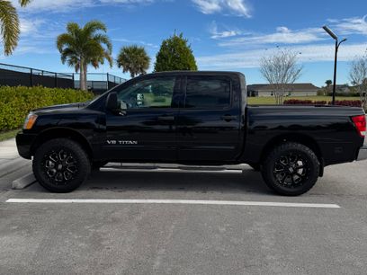 Used 2010 Nissan Titan SE w/ SE Premium Utility Pkg