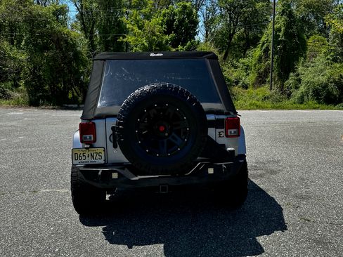 Used 2015 Jeep Wrangler Unlimited Sahara w/ Dual Top Group AWD/4WD image 2