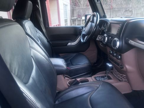 Used 2013 Jeep Wrangler Unlimited Sahara w/ Mopar Chrome Edition Group image 2