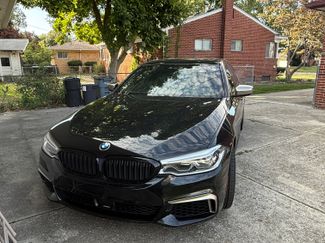 Used 2020 BMW M550i xDrive w/ Executive Package image 1