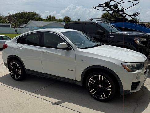 Used 2016 BMW X4 xDrive28i AWD/4WD image 1