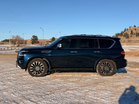 Used 2021 Nissan Armada Platinum w/ Captain's Chairs Package image 1