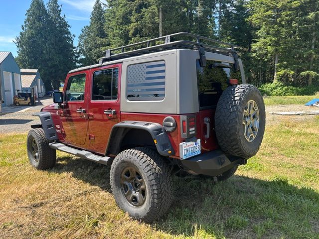 Used 2010 Jeep Wrangler Unlimited Sahara w/ Dual Top Group AWD/4WD image 6