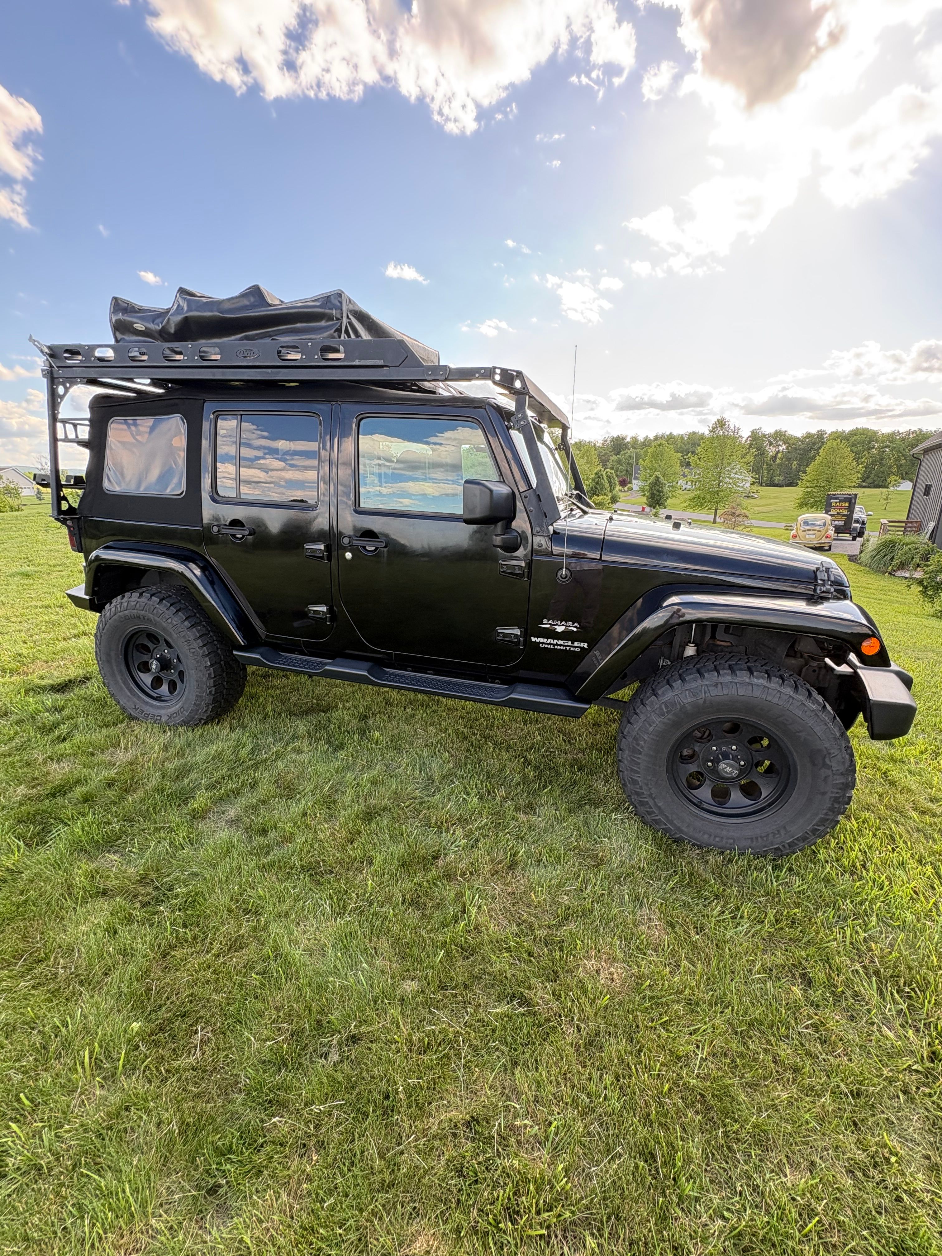 Used 2016 Jeep Wrangler Unlimited Sahara w/ Max Tow Package AWD/4WD image 1