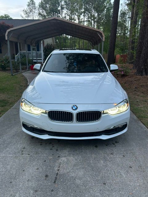 Used 2017 BMW 330i xDrive Sedan AWD/4WD image 1