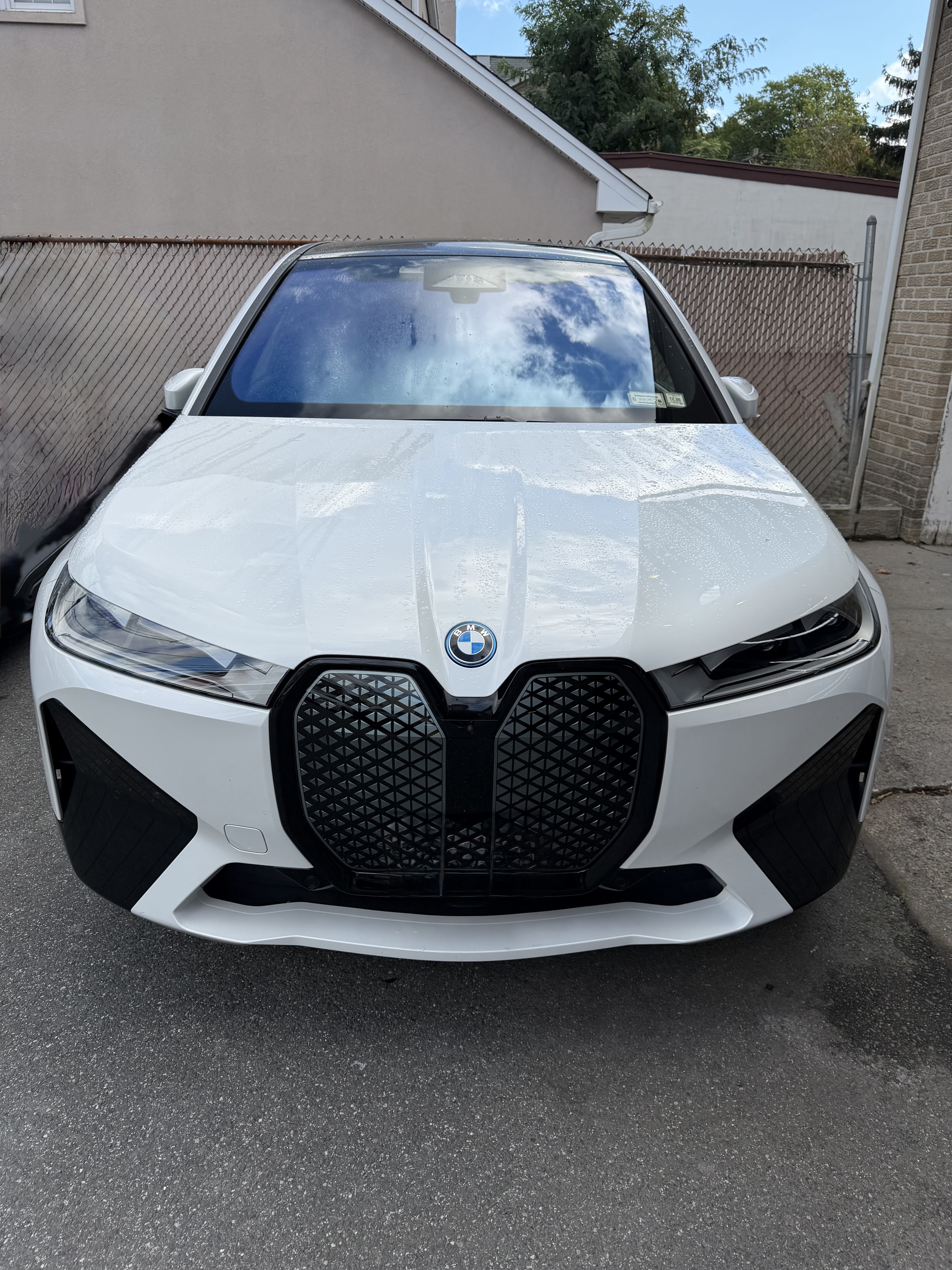 Used 2025 BMW iX xDrive50 w/ Premium Package AWD/4WD image 1