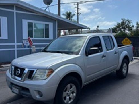 Used 2012 Nissan Frontier SV RWD image 1