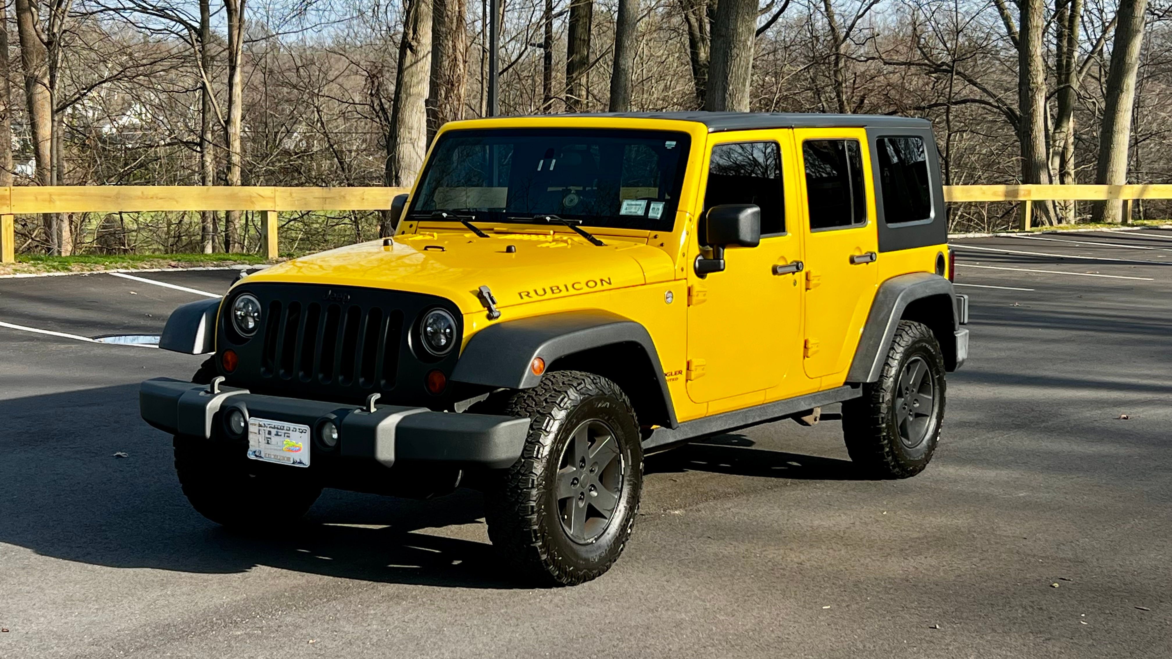 Used 2009 Jeep Wrangler Unlimited Rubicon w/ Dual Top Group AWD/4WD image 1