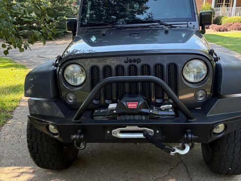 Used 2014 Jeep Wrangler Unlimited Rubicon w/ Connectivity Group AWD/4WD image 1