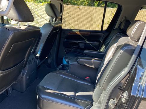 Used 2011 Nissan Armada Platinum w/ 2nd Row Captain Seat Pkg image 13