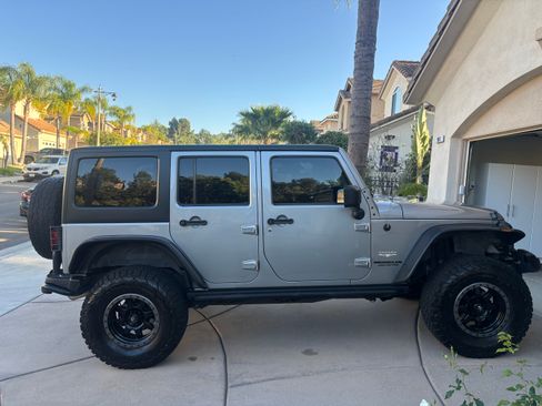 Used 2013 Jeep Wrangler Unlimited Sahara w/ Connectivity Group image 1