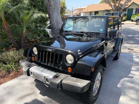 Used 2013 Jeep Wrangler Unlimited Sahara w/ Trailer Tow Group image 1