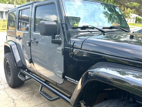 Used 2014 Jeep Wrangler Unlimited Sahara w/ Max Tow Package AWD/4WD image 1