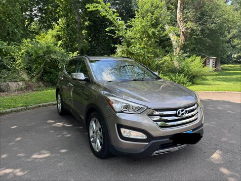 Used 2014 Hyundai Santa Fe Sport 2.0T w/ Navigation Package 06 AWD/4WD image 1