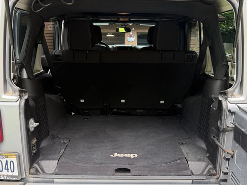 Used 2015 Jeep Wrangler Unlimited Sahara w/ Dual Top Group AWD/4WD image 11