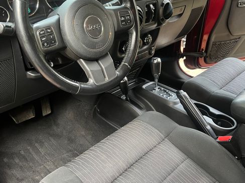 Used 2012 Jeep Wrangler Unlimited Sport AWD/4WD image 13