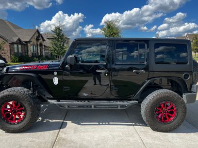 Used 2013 Jeep Wrangler Unlimited Sport